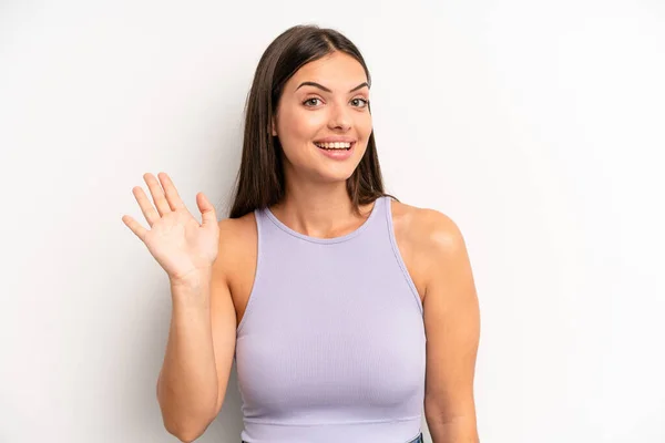 Young Adult Pretty Woman Smiling Happily Cheerfully Waving Hand Welcoming — Foto Stock