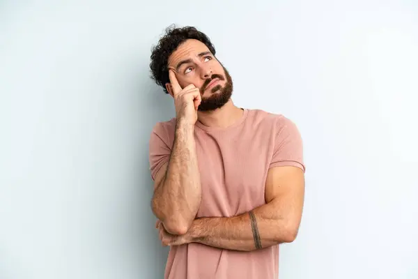 Young Adult Bearded Man Concentrated Look Wondering Doubtful Expression Looking — Stock Photo, Image