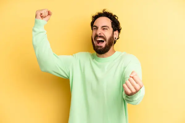 Young Adult Bearded Man Shouting Triumphantly Looking Excited Happy Surprised — Stock Photo, Image