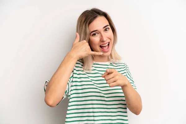 Young Adult Blonde Woman Smiling Cheerfully Pointing Camera While Making — Stockfoto