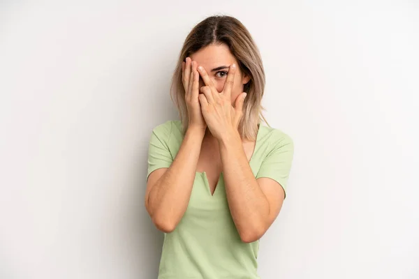 Young Adult Blonde Woman Feeling Scared Embarrassed Peeking Spying Eyes — Stockfoto