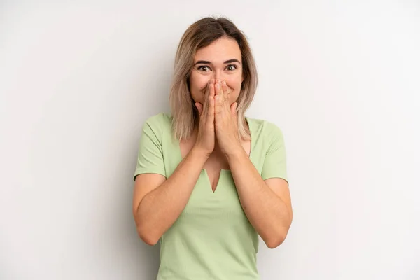 Young Adult Blonde Woman Happy Excited Surprised Amazed Covering Mouth — Stock Photo, Image