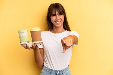 pointing at camera choosing you. take away coffees