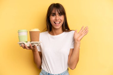 feeling happy and astonished at something unbelievable. take away coffees