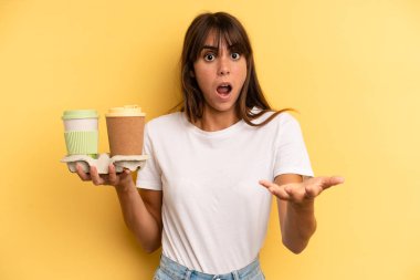 amazed, shocked and astonished with an unbelievable surprise. take away coffees