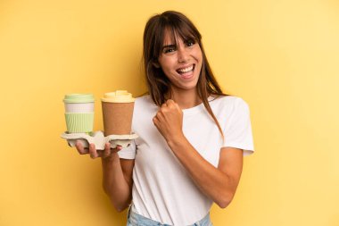 feeling happy and facing a challenge or celebrating. take away coffees