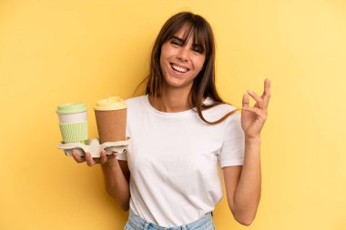 feeling happy, surprised realizing a solution or idea. take away coffees