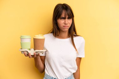 feeling puzzled and confused. take away coffees