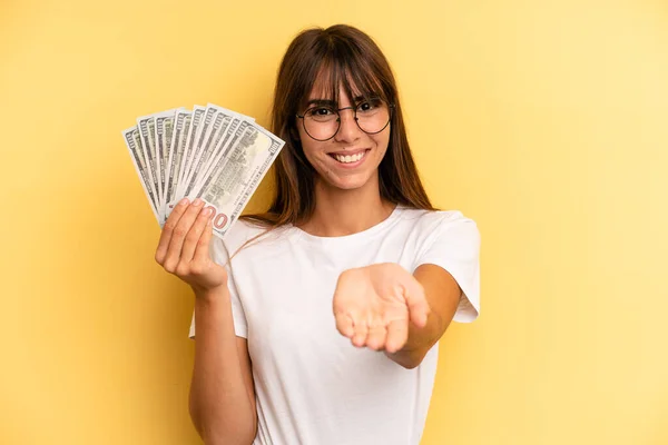 Hispanic Woman Smiling Happily Friendly Offering Showing Concept Dollar Banknotes — Foto Stock