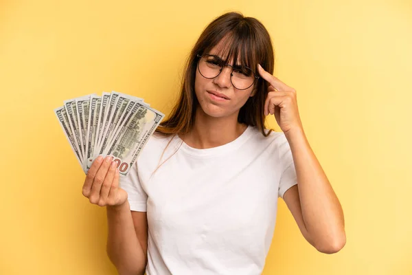 Hispanic Woman Feeling Confused Puzzled Showing You Insane Dollar Banknotes — 스톡 사진