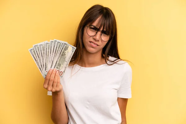 Hispanic Woman Feeling Puzzled Confused Dollar Banknotes Concept — Foto de Stock