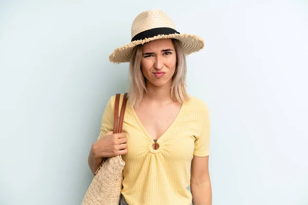 Blonde Woman Looking Puzzled Confused Summer Concept — Foto Stock