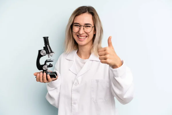 Blonde Woman Feeling Proud Smiling Positively Thumbs Scientist Student Concept — Stockfoto