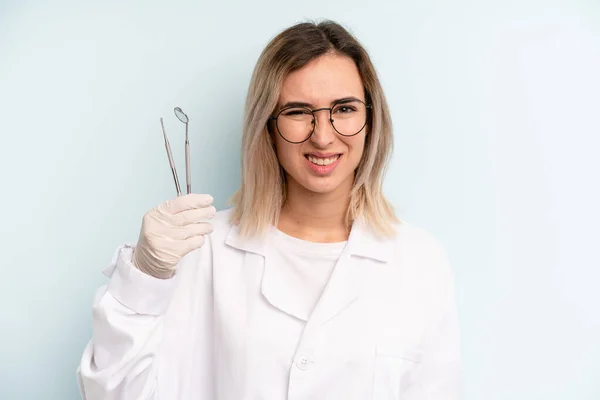 Blonde Woman Feeling Puzzled Confused Dentist Concept — Stockfoto