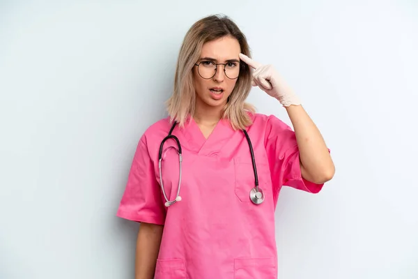 Blonde Woman Feeling Confused Puzzled Showing You Insane Nurse Concept — Photo