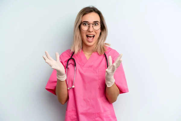 Blonde Woman Feeling Happy Astonished Something Unbelievable Nurse Concept — Stockfoto