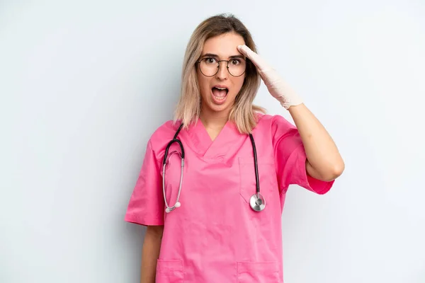 Blonde Woman Looking Happy Astonished Surprised Nurse Concept — Stockfoto