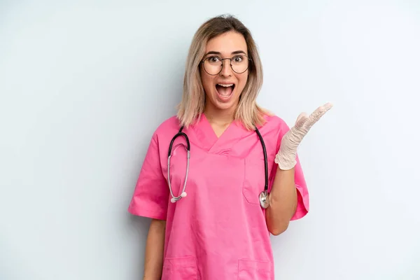 Blonde Woman Feeling Happy Surprised Realizing Solution Idea Nurse Concept — Stockfoto