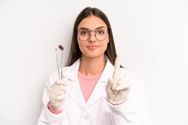 Pretty Woman Smiling Proudly Confidently Making Number One Dentist Concept — Stockfoto