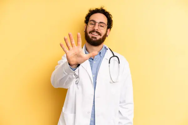 Young Man Smiling Looking Friendly Showing Number Five Medicine Student — Stock Photo, Image