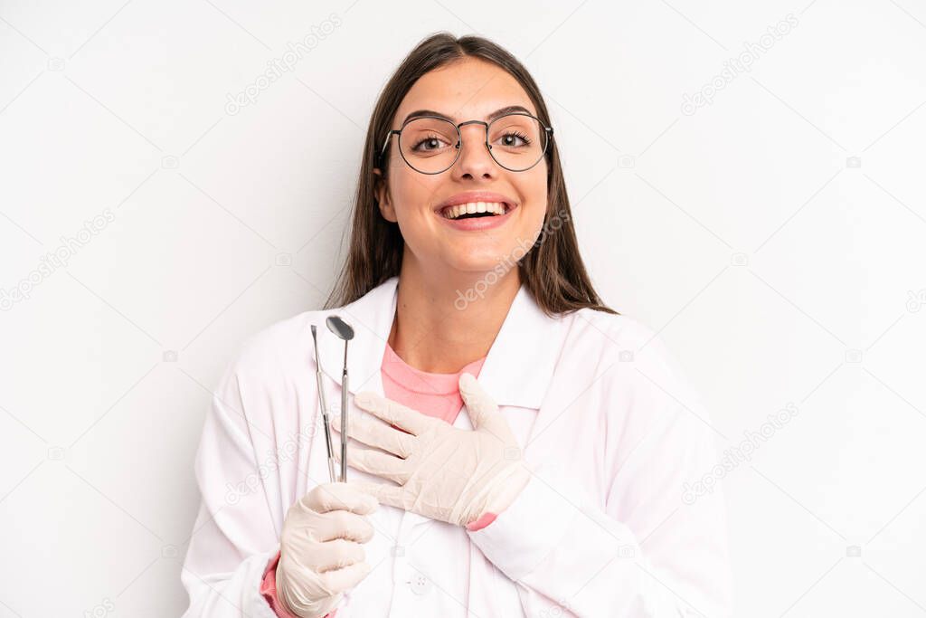pretty woman laughing out loud at some hilarious joke. dentist concept
