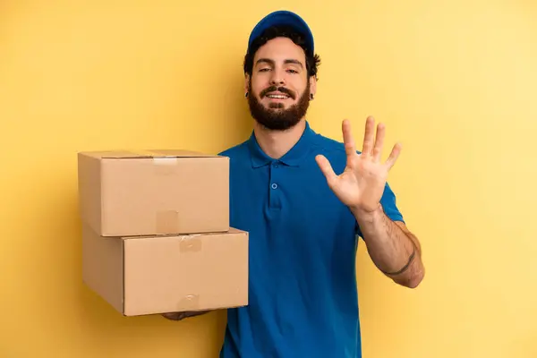 Young Man Smiling Looking Friendly Showing Number Five Company Employee — Stock Photo, Image