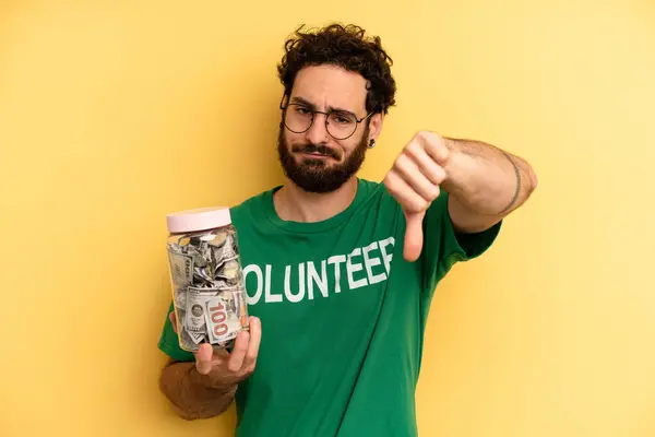 Young Man Feeling Cross Showing Thumbs Volunteer Concept — Stock Photo, Image