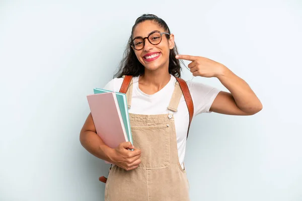 Hispanic Woman Smiling Confidently Pointing Own Broad Smile University Student — Stock Photo, Image