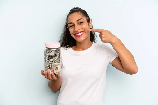 Hispanic Woman Smiling Confidently Pointing Own Broad Smile Savings Concept — Foto Stock