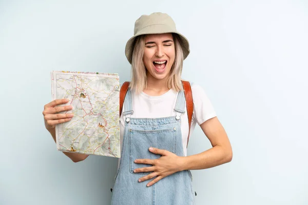 Blonde Woman Laughing Out Loud Some Hilarious Joke Tourist Map — Zdjęcie stockowe