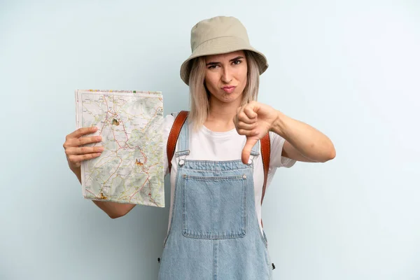 Blonde Woman Feeling Cross Showing Thumbs Tourist Map Concept — Zdjęcie stockowe