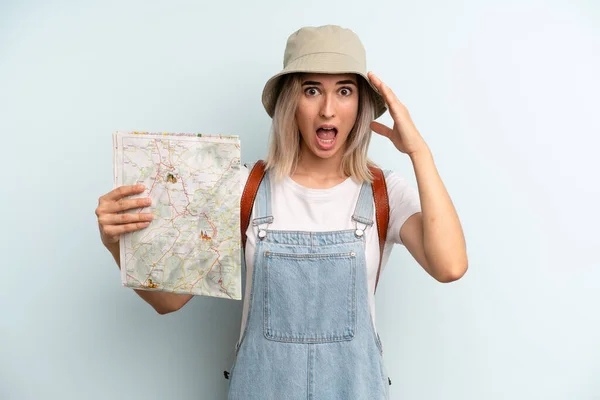 Blonde Woman Looking Happy Astonished Surprised Tourist Map Concept — Zdjęcie stockowe