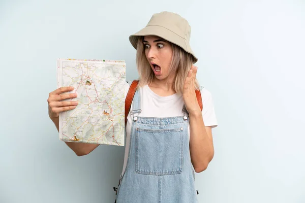 Blonde Woman Feeling Happy Excited Surprised Tourist Map Concept — Zdjęcie stockowe