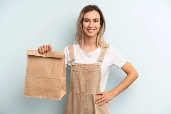 Blonde Woman Smiling Happily Hand Hip Confident Take Away Delivery — ストック写真