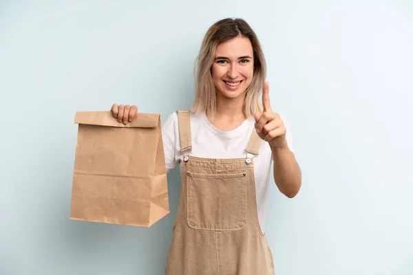 Blonde Woman Smiling Proudly Confidently Making Number One Take Away — ストック写真