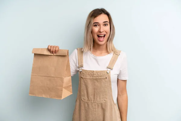 Blonde Woman Looking Happy Pleasantly Surprised Take Away Delivery Concept — ストック写真