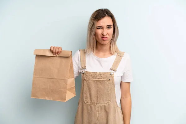Blonde Woman Feeling Puzzled Confused Take Away Delivery Concept — ストック写真