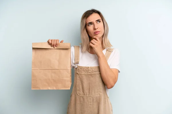 Blonde Woman Thinking Feeling Doubtful Confused Take Away Delivery Concept — ストック写真