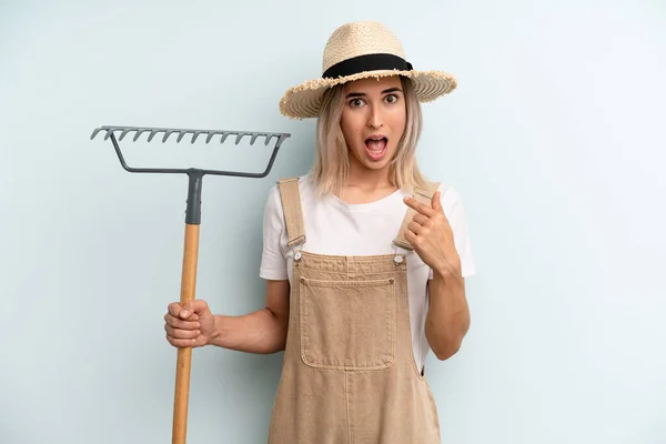Blonde Woman Feeling Happy Pointing Self Excited Farmer Rake Cocnept — Stockfoto
