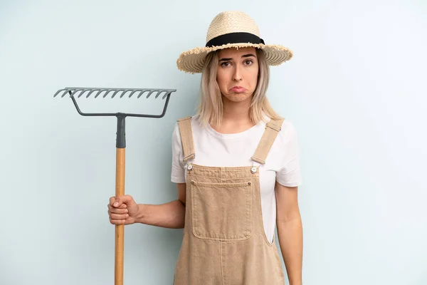Blonde Woman Feeling Sad Whiney Unhappy Look Crying Farmer Rake — Stockfoto