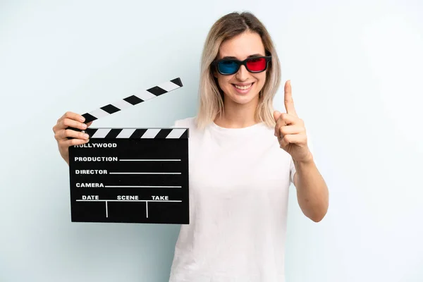 Blonde Woman Smiling Proudly Confidently Making Number One Film Movie — Stockfoto