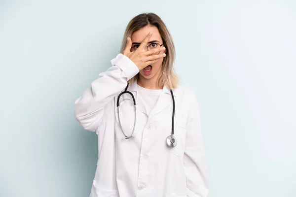 Blonde Woman Looking Shocked Scared Terrified Covering Face Hand Medicine — Zdjęcie stockowe