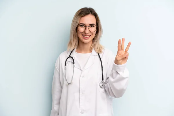 Blonde Woman Smiling Looking Friendly Showing Number Three Medicine Student — Stockfoto