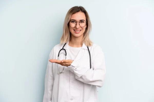 Blonde Woman Smiling Cheerfully Feeling Happy Showing Concept Medicine Student — Stockfoto