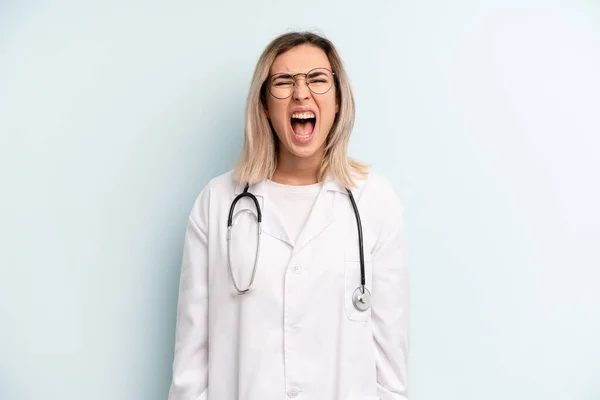 Blonde Woman Shouting Aggressively Looking Very Angry Medicine Student Concept — Stockfoto