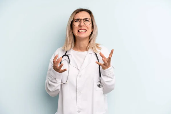 Blonde Woman Looking Desperate Frustrated Stressed Medicine Student Concept — Stockfoto