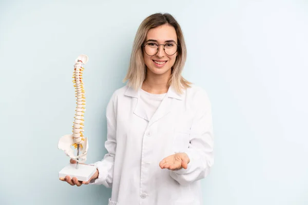 Blonde Woman Smiling Happily Friendly Offering Showing Concept Medicine Student — Stockfoto