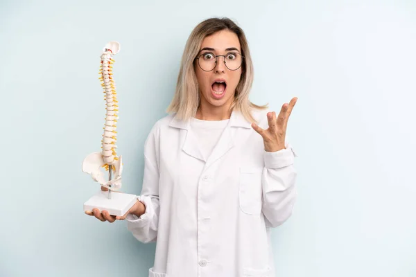 Blonde Woman Feeling Extremely Shocked Surprised Medicine Student Concept —  Fotos de Stock