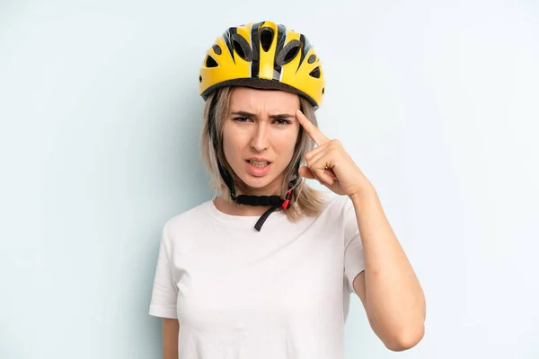 Blonde Woman Feeling Confused Puzzled Showing You Insane Bike Sport — Stockfoto