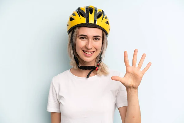 Blonde Woman Smiling Looking Friendly Showing Number Five Bike Sport — Zdjęcie stockowe